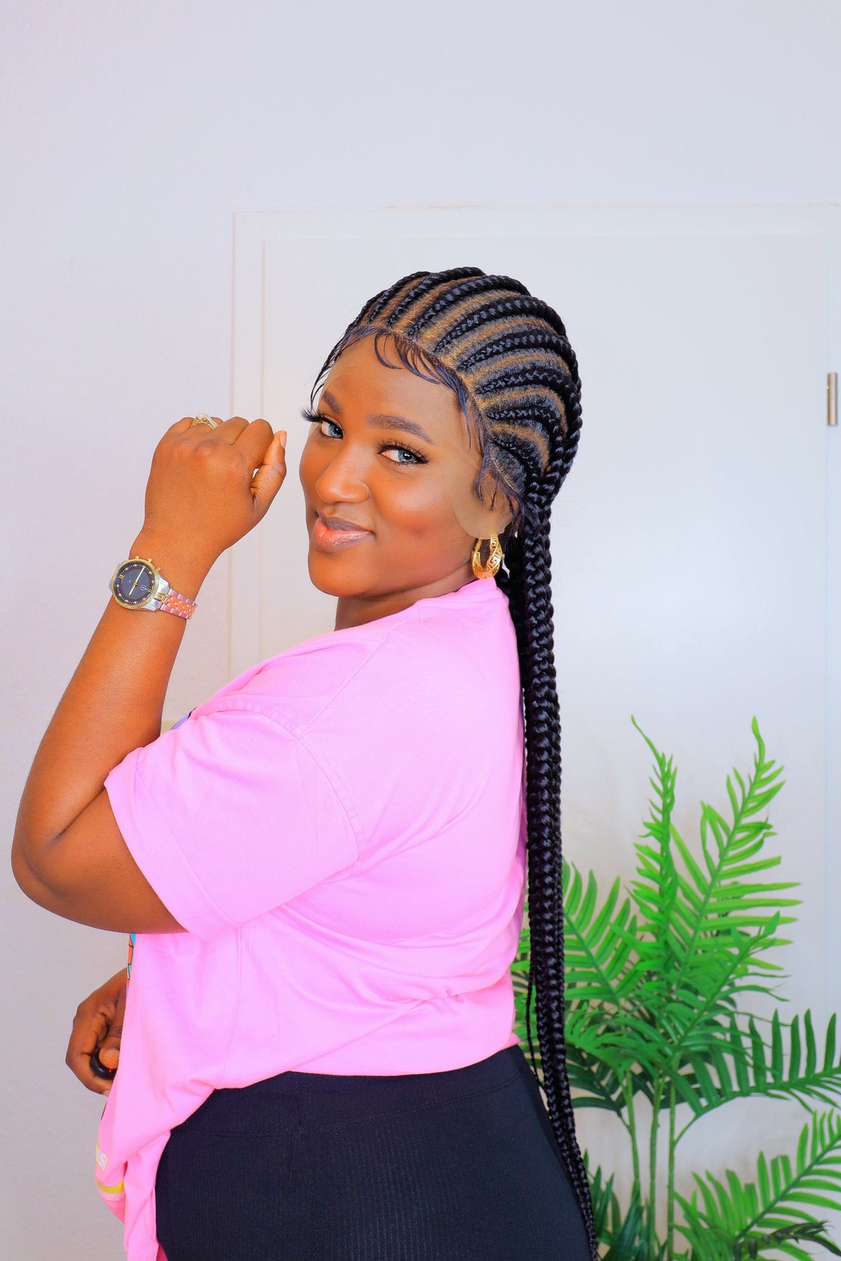 Eminado Cornrows Geena's hair